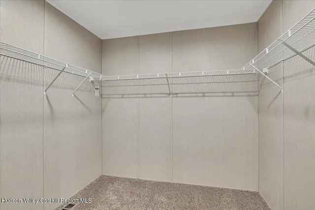 a view of a room with racks on the wall