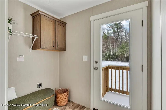 a bathroom with a tub and shower