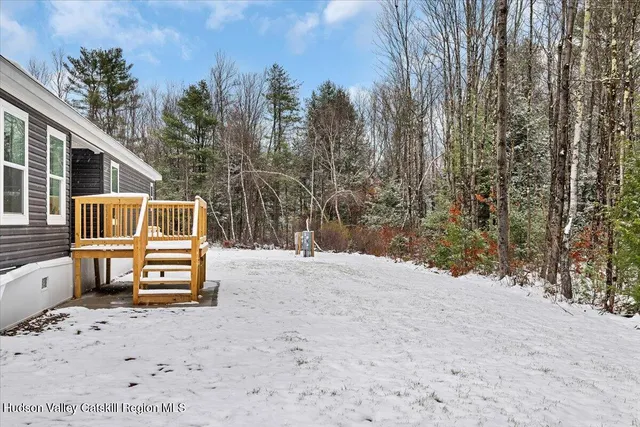 a view of a backyard with a house