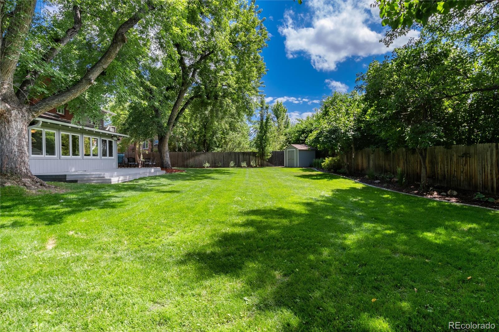 3375 Nelson Street Wheat Ridge, CO 80033 - Photo 29 of 35 a house view with a garden space