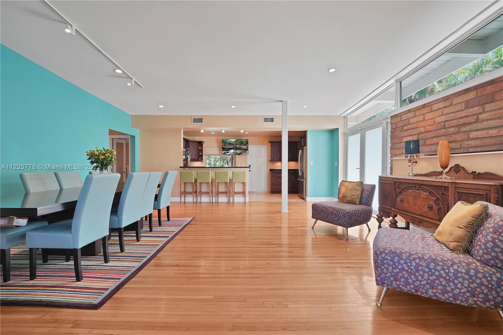 1810 Alamanda Drive North Miami, FL 33181 - Photo 13 of 40 a living room with furniture rug and wooden floor