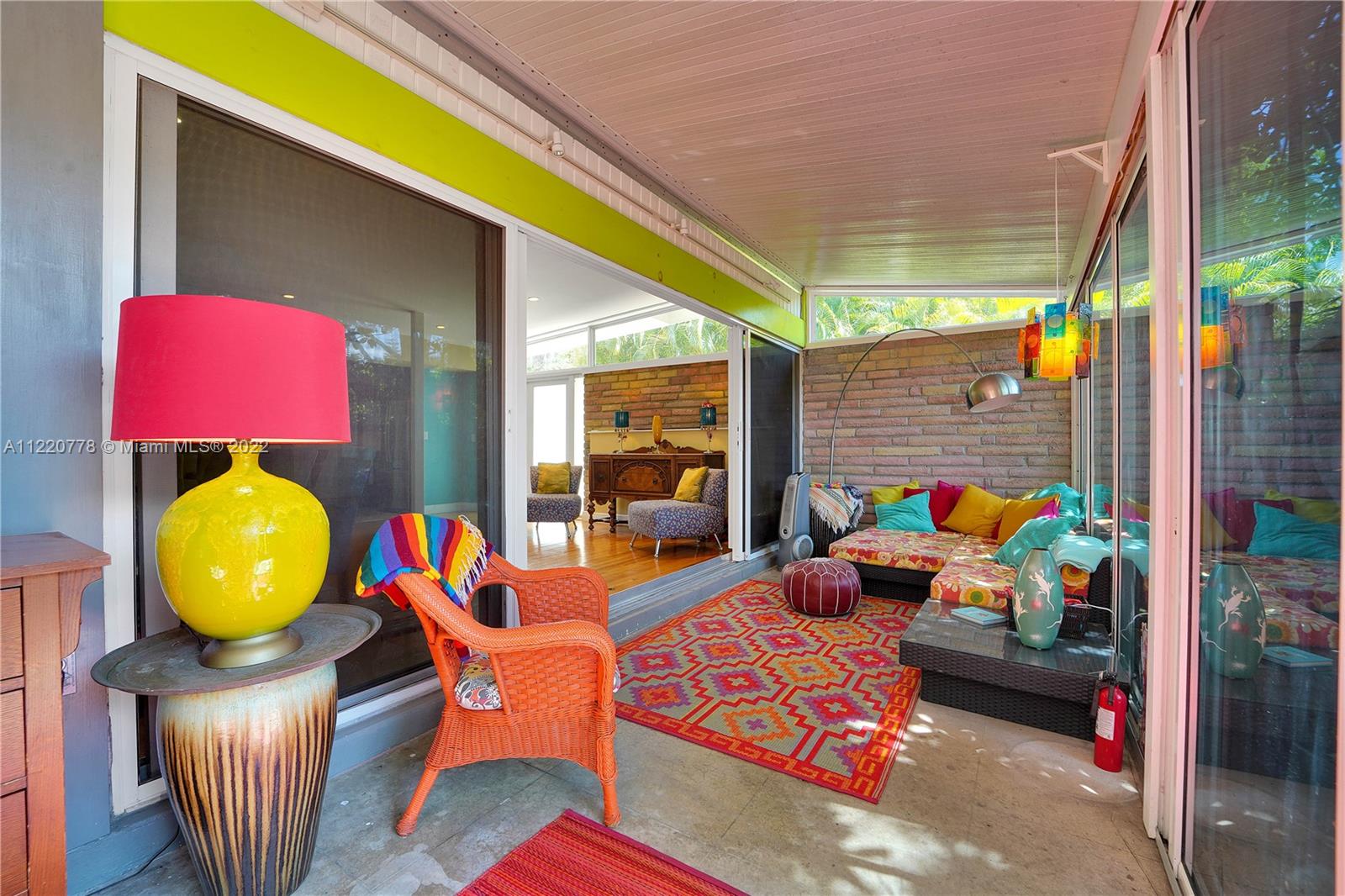 1810 Alamanda Drive North Miami, FL 33181 - Photo 19 of 40 a outdoor living space with furniture and garden view