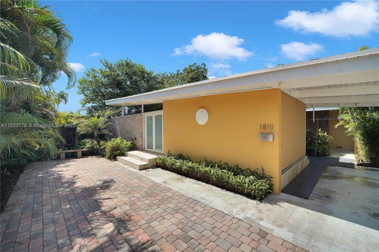 1810 Alamanda Drive North Miami, FL 33181 - Photo 2 of 40 a view of a backyard of the house