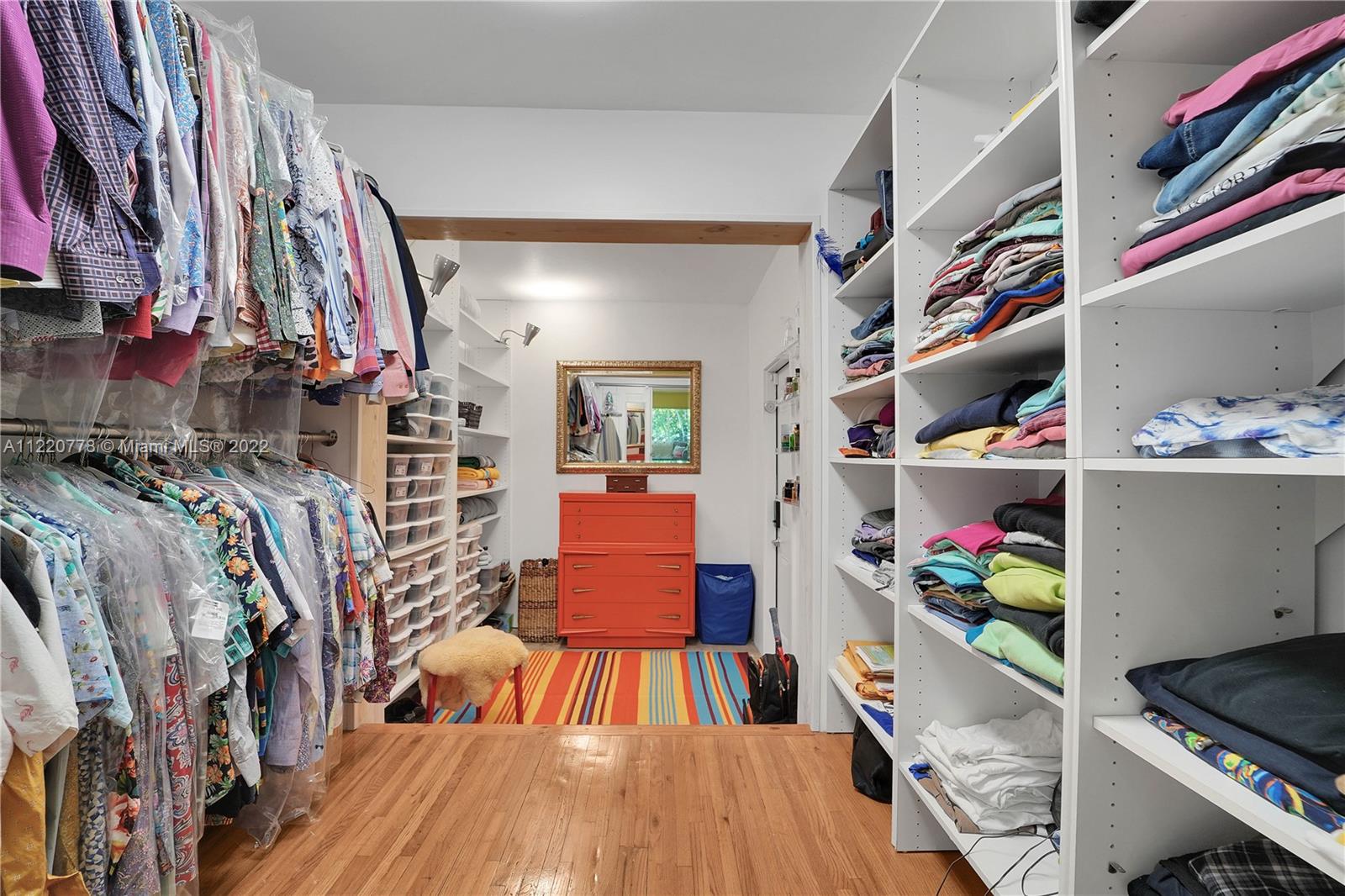 1810 Alamanda Drive North Miami, FL 33181 - Photo 29 of 40 a view of walk in closet with clothes and shoes