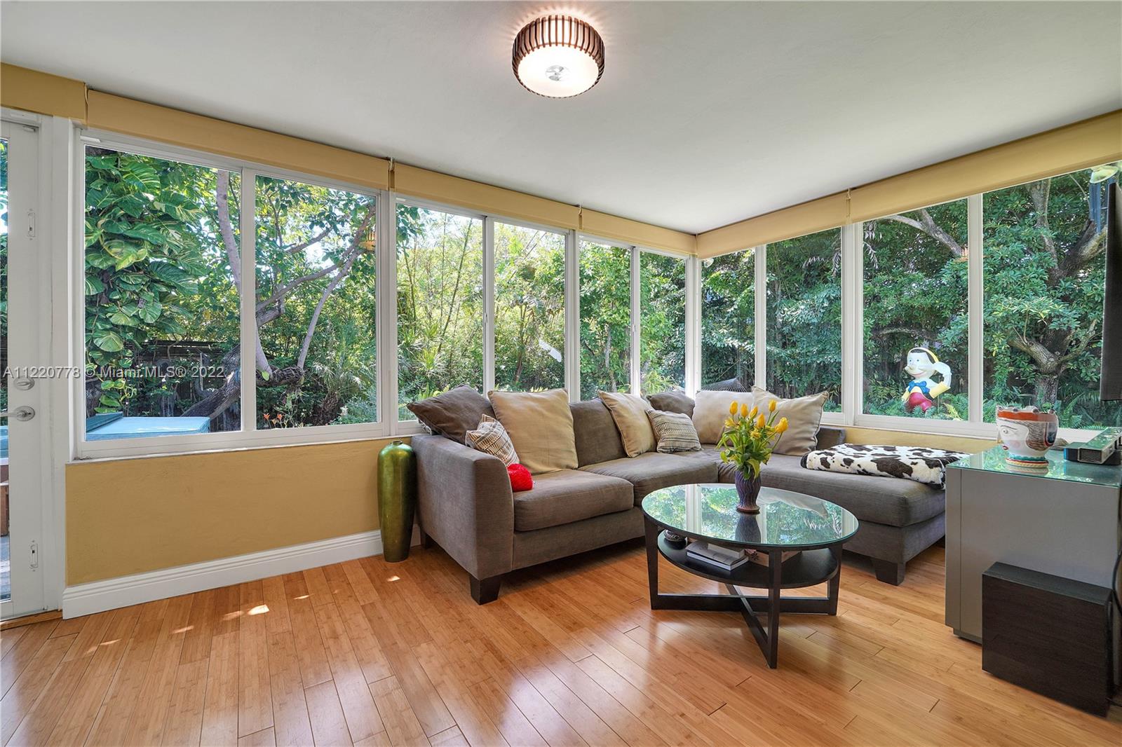 1810 Alamanda Drive North Miami, FL 33181 - Photo 31 of 40 a living room with furniture and a large window