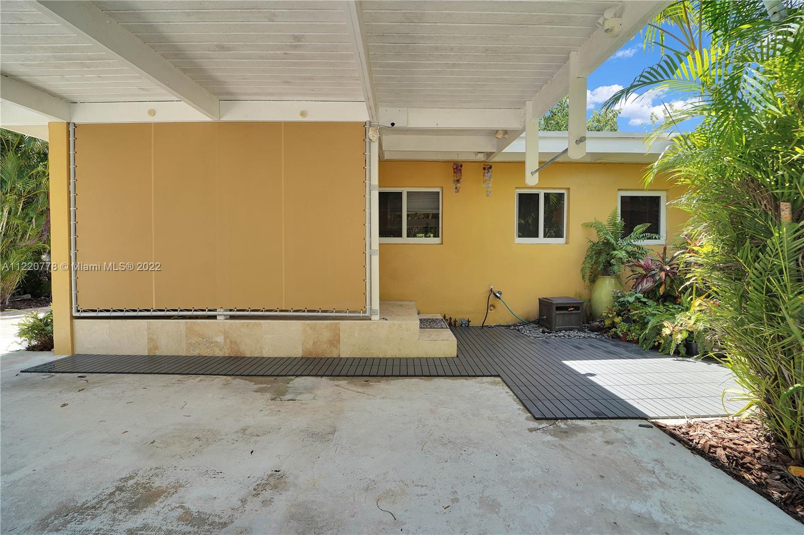 1810 Alamanda Drive North Miami, FL 33181 - Photo 4 of 40 a view of a back yard of the house