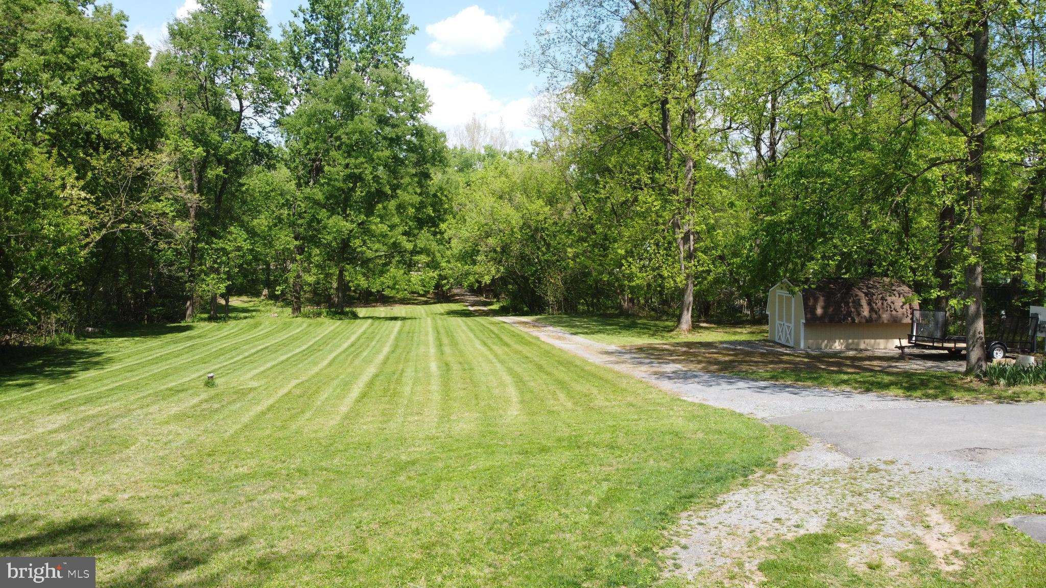 3480 Whitings Neck Road Martinsburg, WV 25404 - Photo 17 of 36 a view of backyard with swimming pool and sitting area