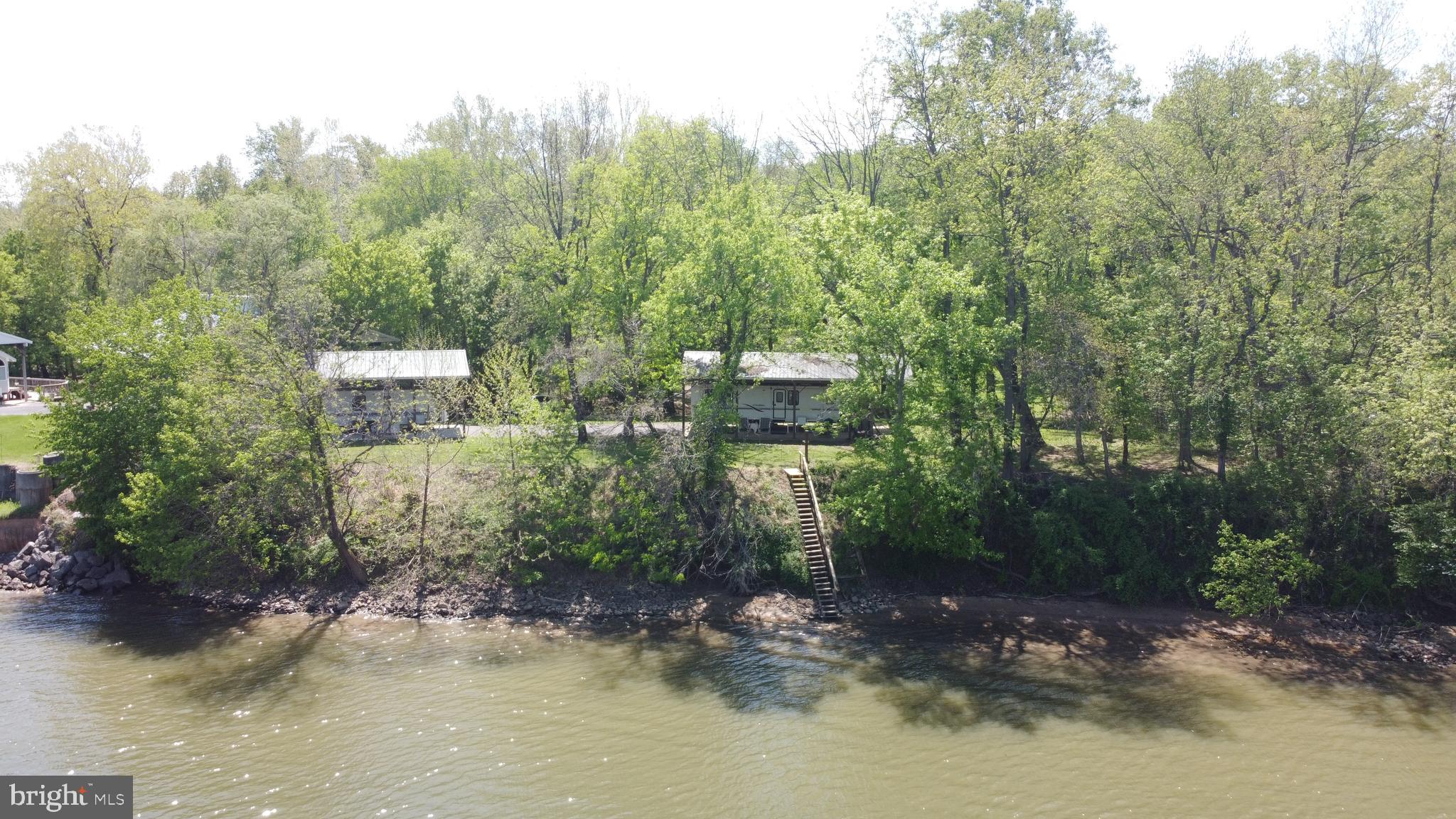 3480 Whitings Neck Road Martinsburg, WV 25404 - Photo 24 of 36 a view of a lake with lots of trees