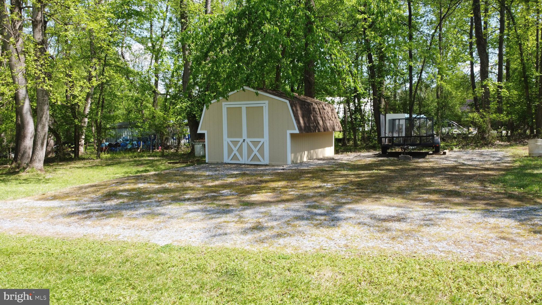 3480 Whitings Neck Road Martinsburg, WV 25404 - Photo 31 of 36 a view of a house with backyard and trees
