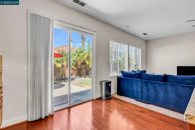 a white toilet sitting next to a white sink