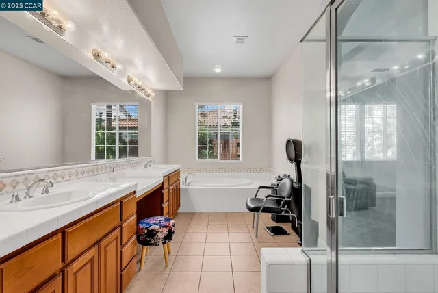 a room with furniture a rug and a window