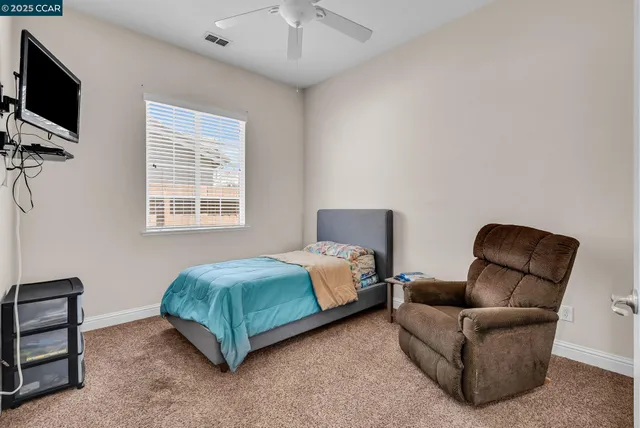 a view of swimming pool with a garden and trees