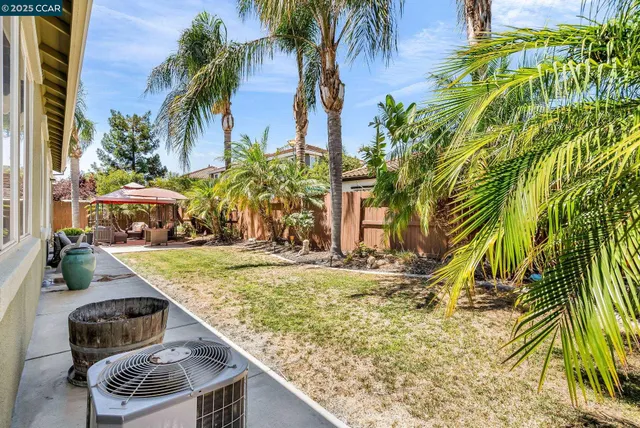 a outdoor living space with furniture and garden view