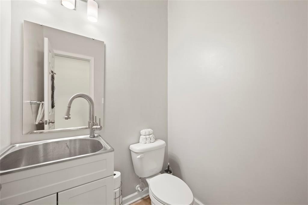 141 Rylie Drive Harmony, PA 16037 - Photo 15 of 31 The seller put a utility type sink in the powder room to offer versatility to the space to have a larger sink to use when needed.