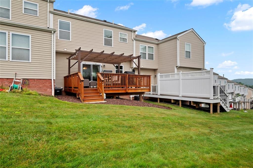 141 Rylie Drive Harmony, PA 16037 - Photo 5 of 31 If you want a townhouse that allows the space to entertain and have family and friends over this is the unit for you.