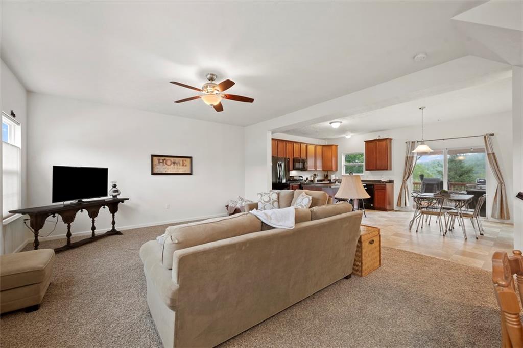 141 Rylie Drive Harmony, PA 16037 - Photo 6 of 31 Inside you will find an open concept that you will appreciate providing ease of communication with friends and family between the kitchen and living area.