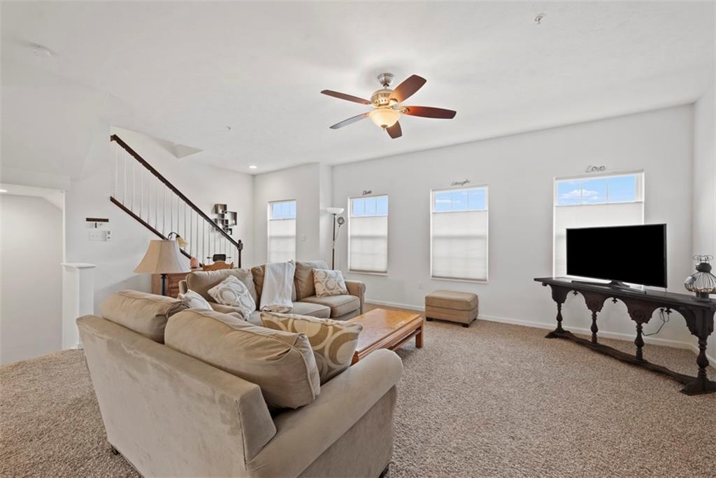 141 Rylie Drive Harmony, PA 16037 - Photo 8 of 31 This large family room has endless possibilities for furniture placement and design options.