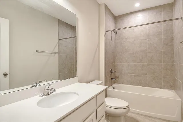 a view of a swimming pool with an outdoor seating