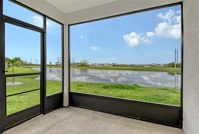 a bathroom with a glass shower door and mirror