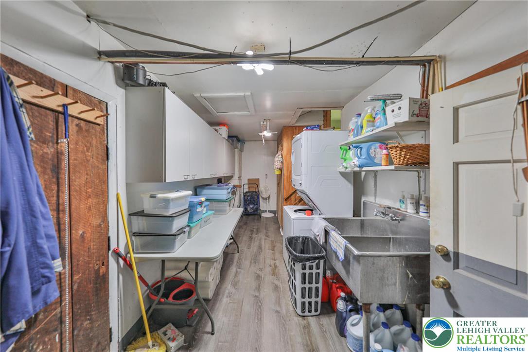 331 Cranberry Creek Road Cresco, PA 18326 - Photo 32 of 95 A well-equipped utility room provides ample storage and functional workspace.