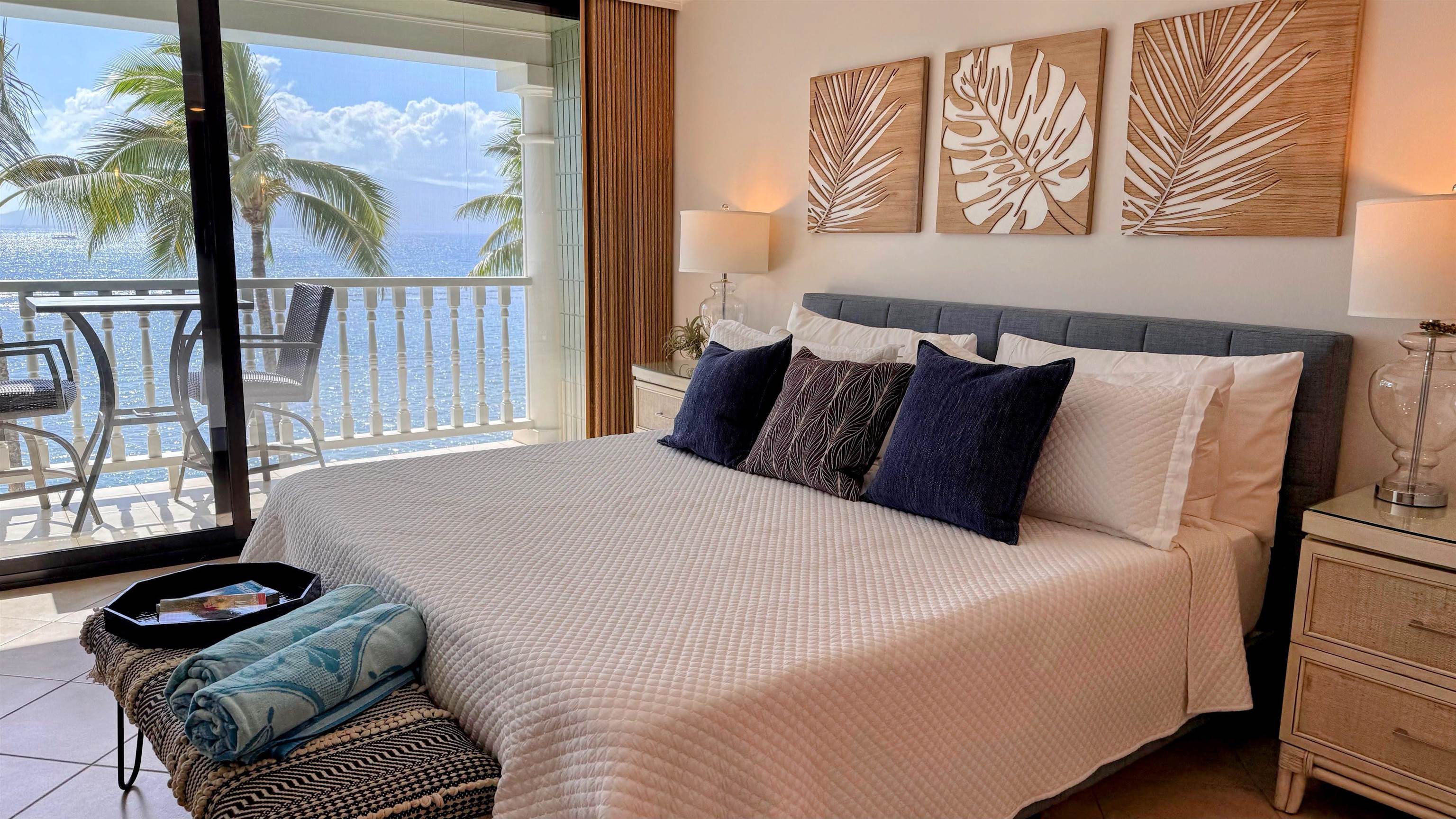 475 Front Street, Unit 419 Lahaina, HI 96761 - Photo 20 of 27 a bedroom with a bed and wooden floor