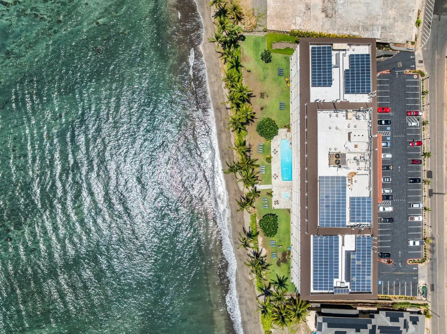 475 Front Street, Unit 419 Lahaina, HI 96761 - Photo 27 of 27 an aerial view of a residential apartment building with a yard