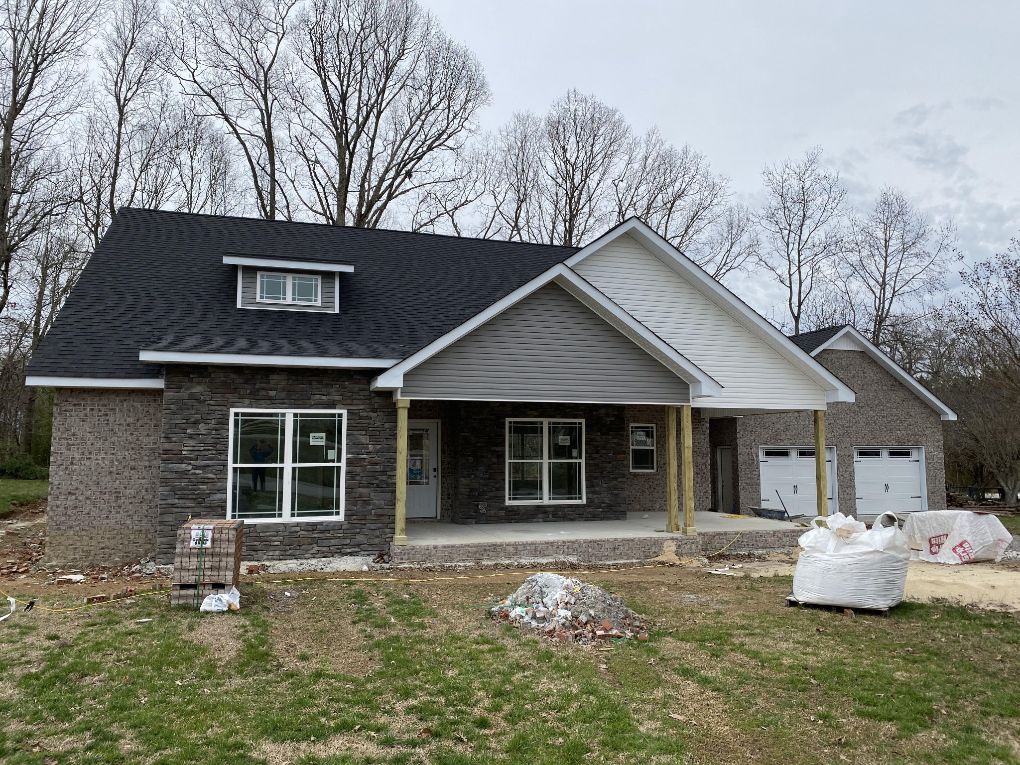 367 Duck River Road Manchester, TN 37355 - Photo 1 of 12 a front view of a house with garden