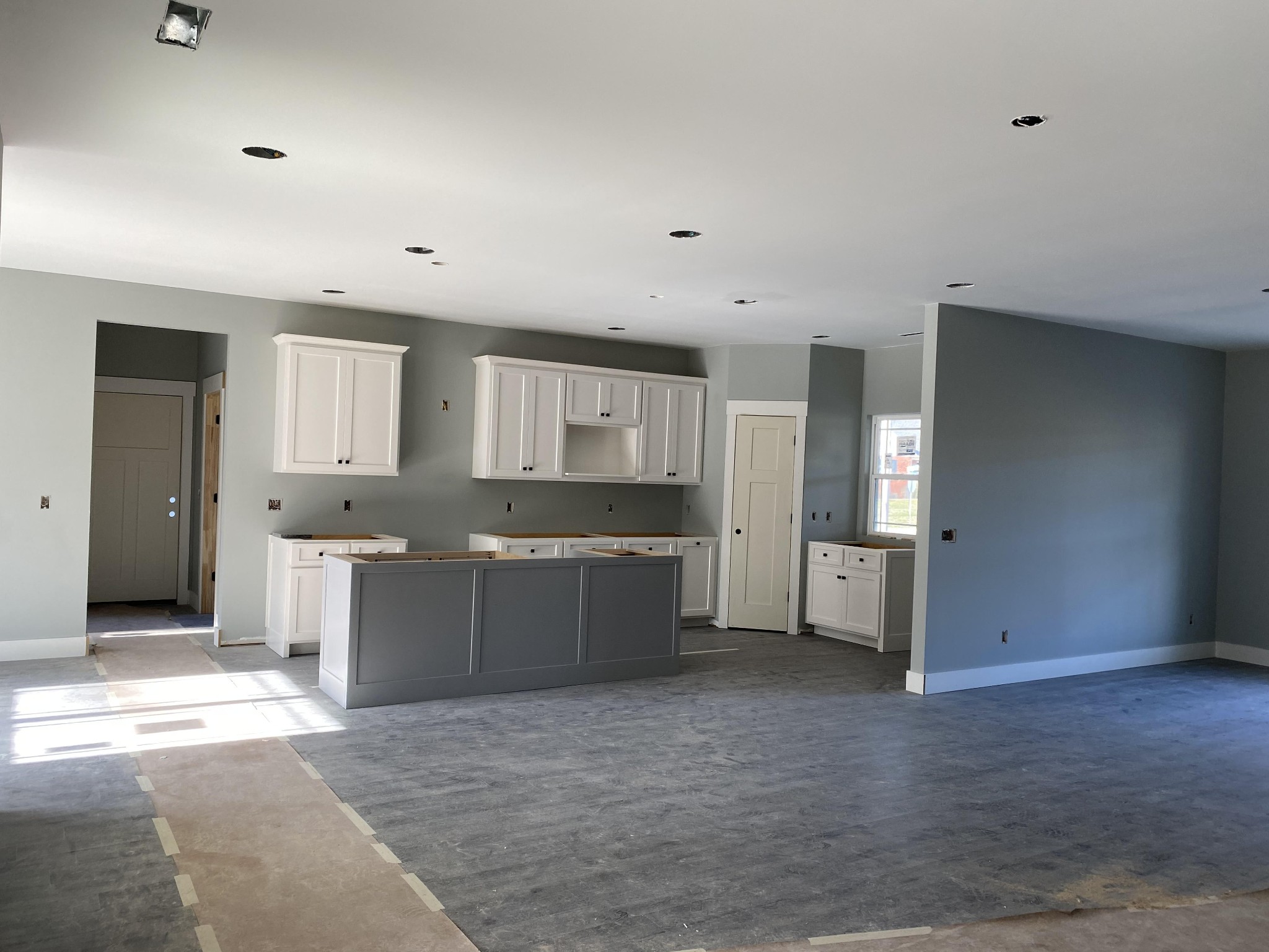 367 Duck River Road Manchester, TN 37355 - Photo 4 of 12 a large room with a lot of cabinets and wooden floor