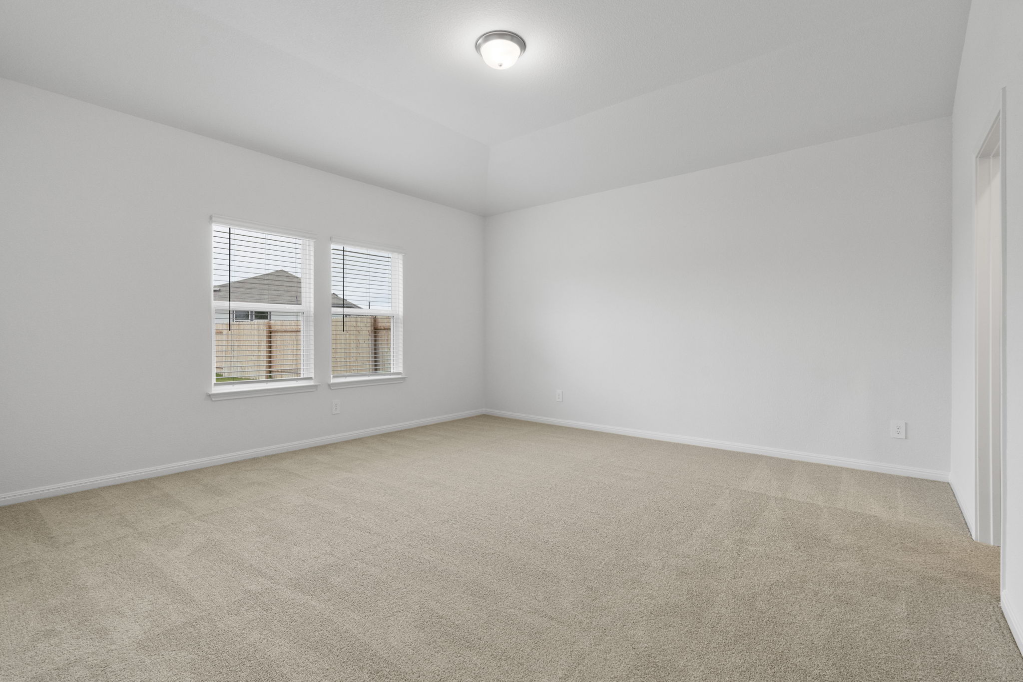 104 Boondoggle Ridge Cedar Creek, TX 78612 - Photo 17 of 33 an empty room with windows