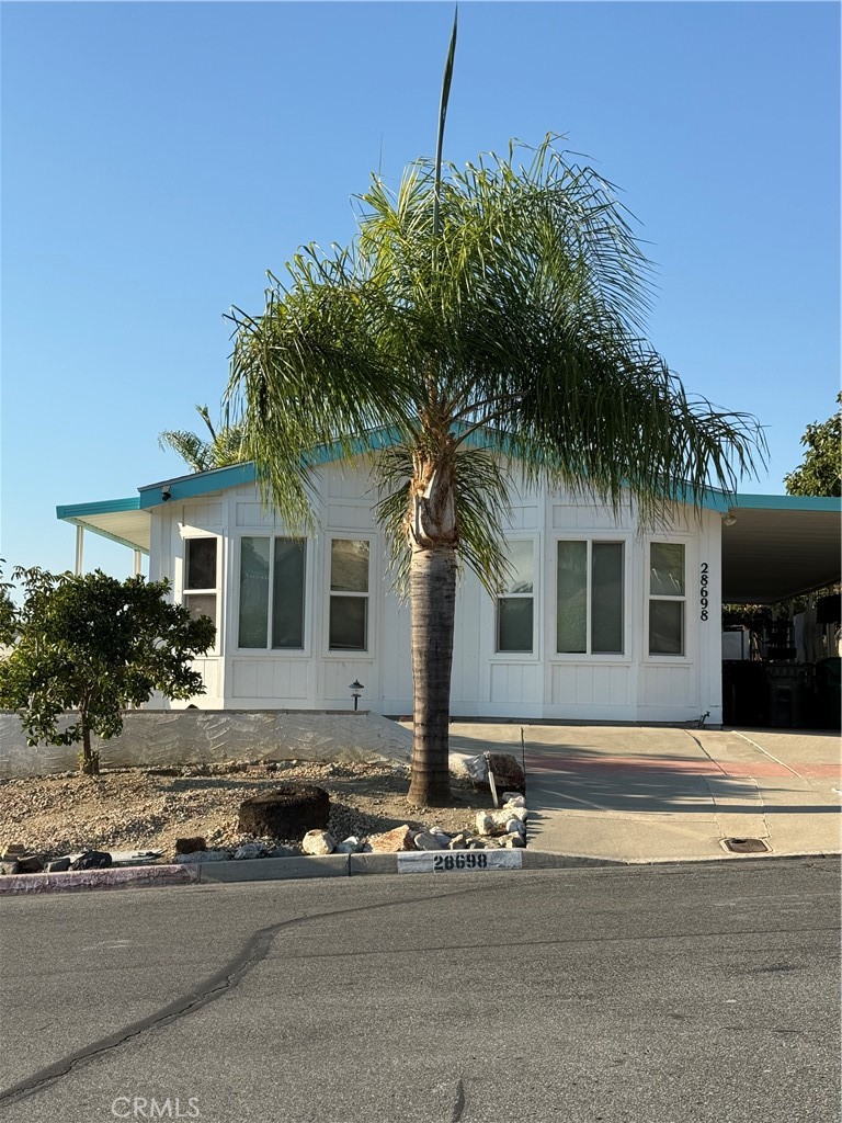 a front view of a house with yard