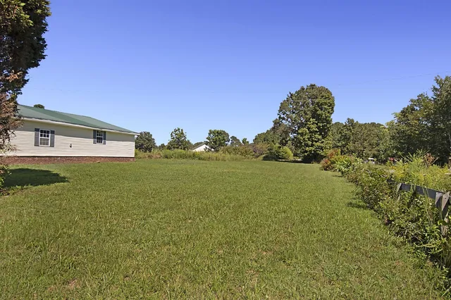 a picture of a bathroom with a shower