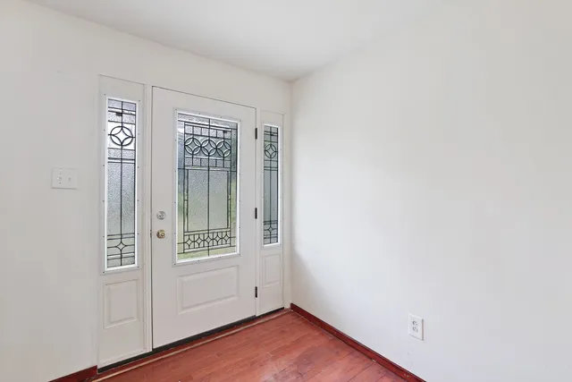 an empty room with window