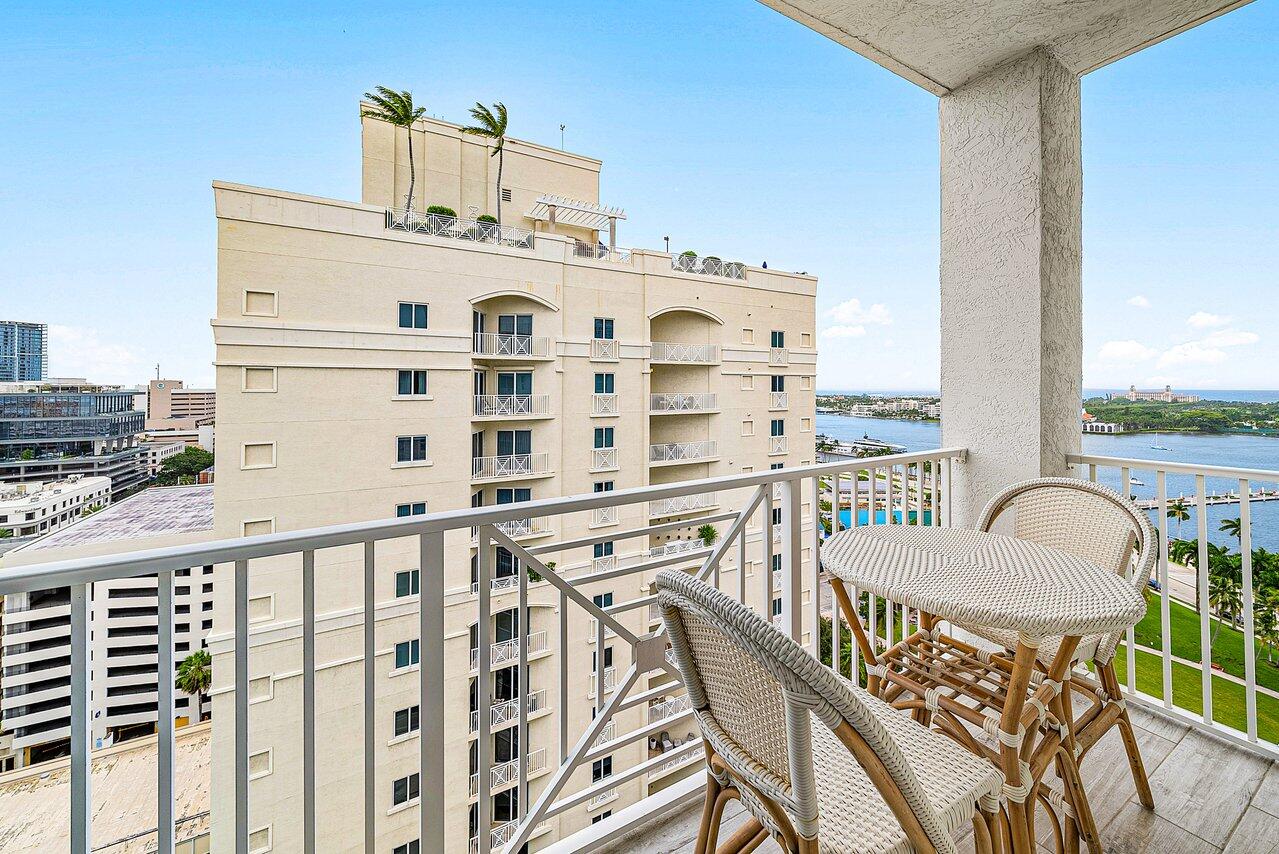 255 Evernia Street, Unit 1502 West Palm Beach, FL 33401 - Photo 25 of 40 a view of a balcony with furniture