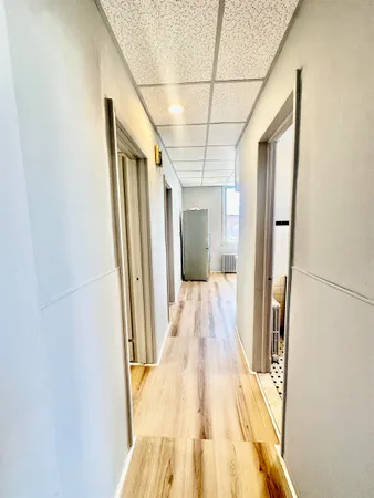 a bathroom with a bathtub and shower