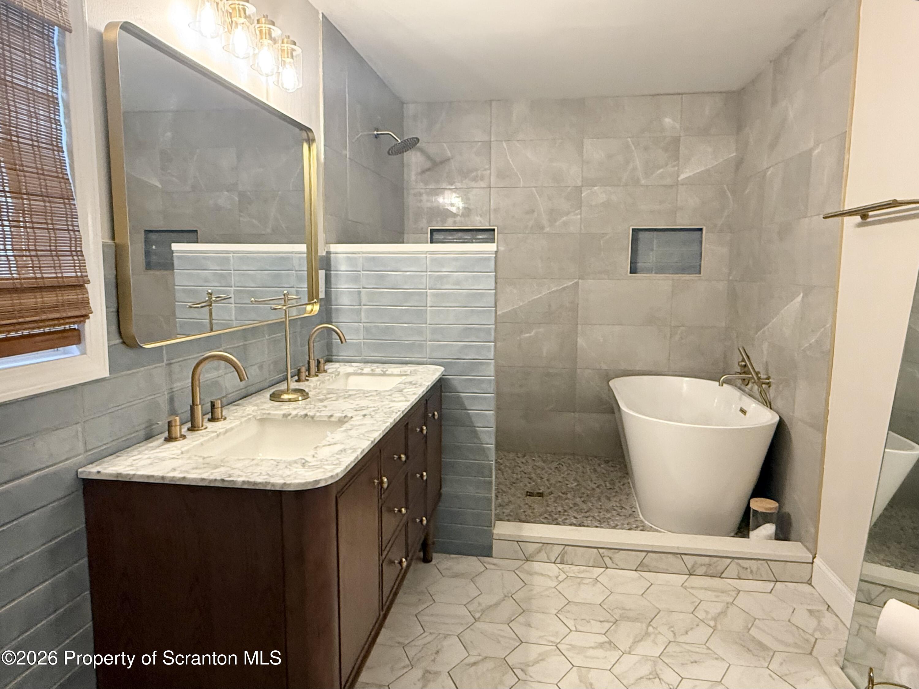 220 Brinkman Road Brackney, PA 18812 - Photo 15 of 32 a bathroom with a sink toilet and mirror