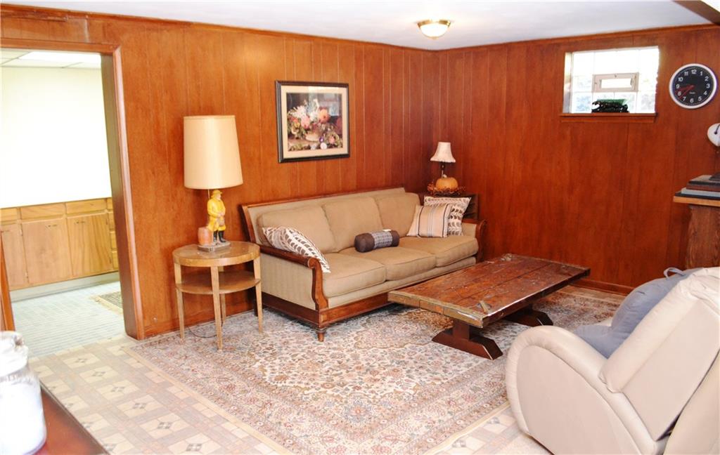 108 Lincoln Road Clairton, PA 15025 - Photo 16 of 21 "L" Shaped Game Room, Large Laundry Room Which Once Was Kitchen For An In-Law Suite, With Full Basement Bath Room