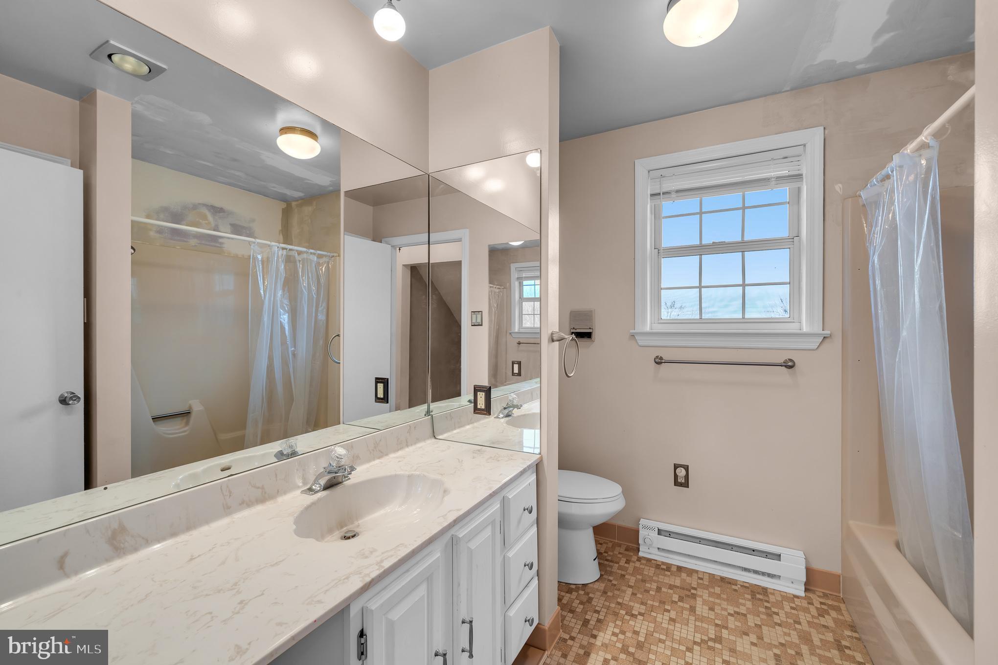 5013 East Berlin Road East Berlin, PA 17316 - Photo 20 of 44 Upstairs hall bath with tub/shower combo