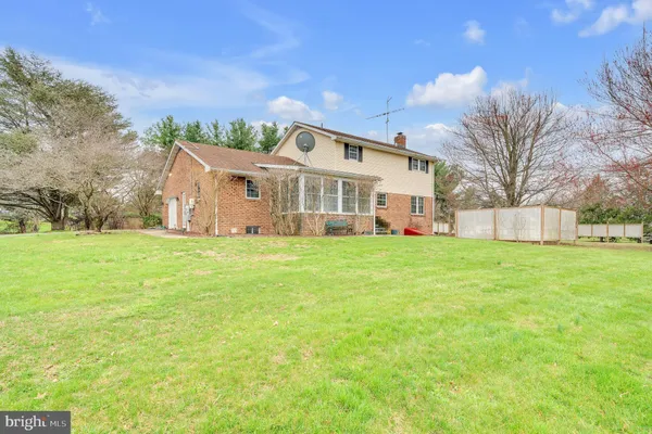 a front view of house with yard