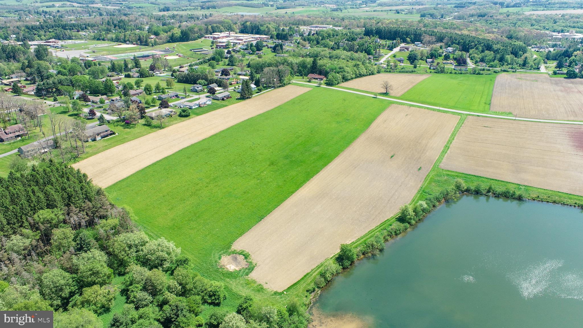 9.75-ac Dennett Road Oakland, MD 21550 - Photo 9 of 30 a view of a lake with a park