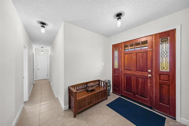 a view of a hallway with closet area