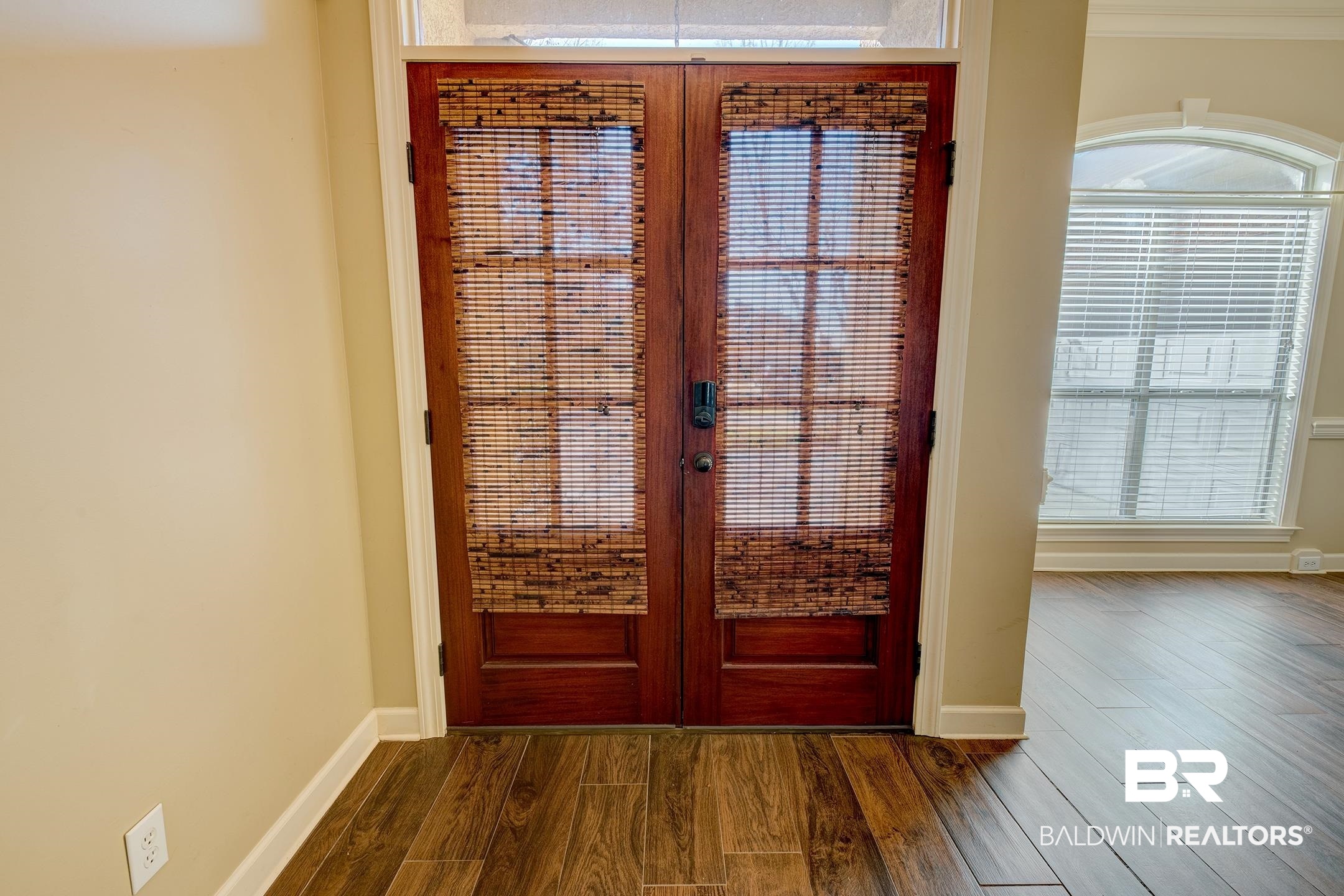 9421 Collier Loop Daphne, AL 36526 - Photo 6 of 31 Entryway with french doors and dark wood-style flooring