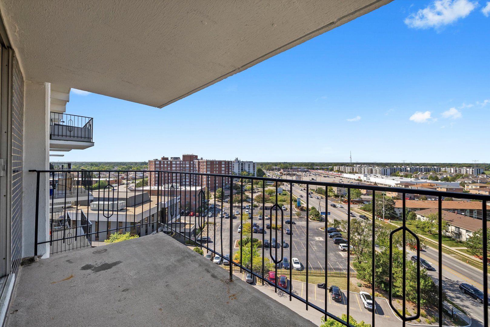 8815 West Golf Road, Unit 11C Niles, IL 60714 - Photo 21 of 31 a view of balcony with city view