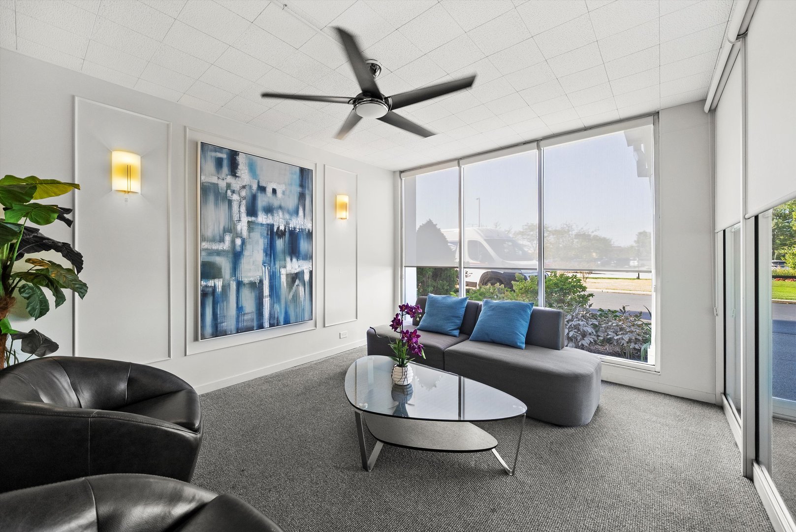 8815 West Golf Road, Unit 11C Niles, IL 60714 - Photo 26 of 31 a living room with furniture and a large window