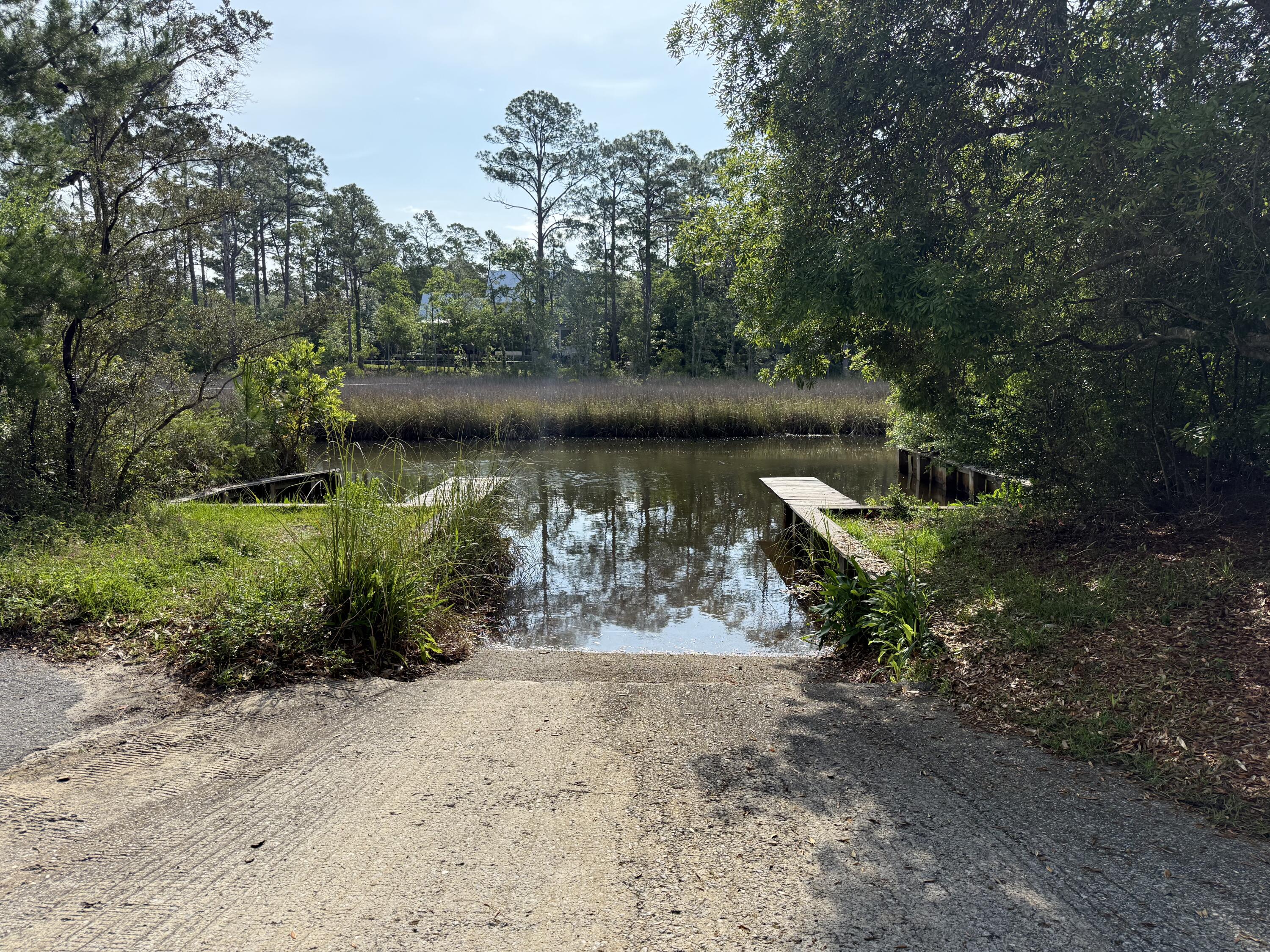 Lot 25 East Point Washington Road Santa Rosa Beach, FL 32459 - Photo 16 of 23 a view of a lake with a yard