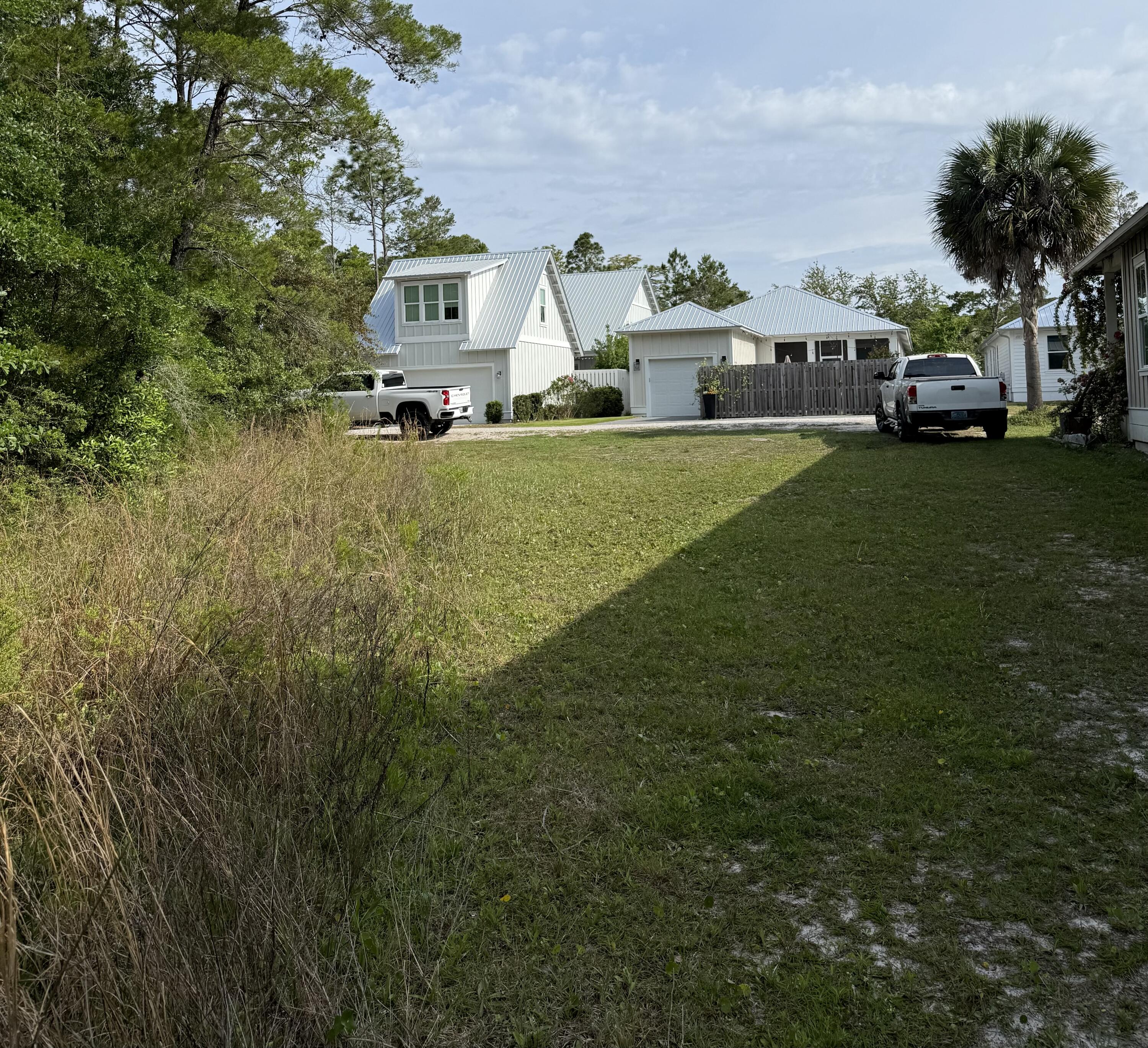 Lot 25 East Point Washington Road Santa Rosa Beach, FL 32459 - Photo 3 of 23 a view of house with outdoor space and garden