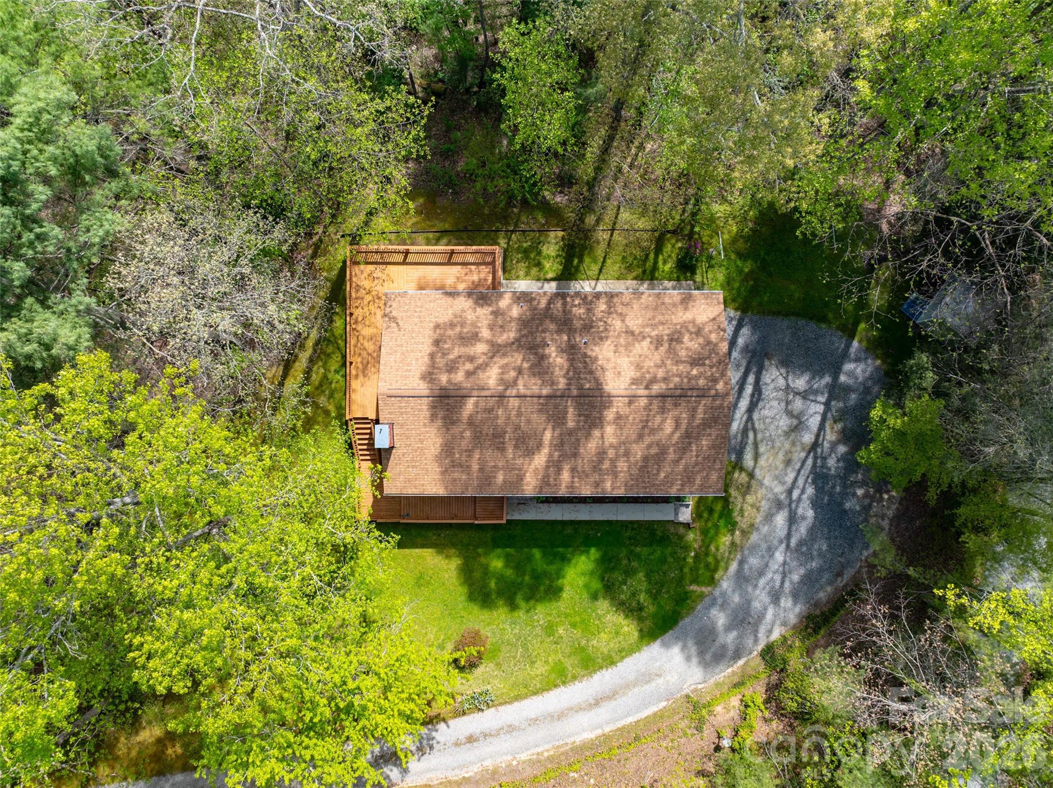 145 Jeter Mountain Road Hendersonville, NC 28739 - Photo 2 of 13 an aerial view of a house