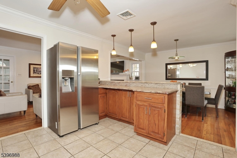 12 Pershing Avenue Ridgewood, NJ 07450 - Photo 13 of 42 a kitchen with stainless steel appliances granite countertop a refrigerator and a sink