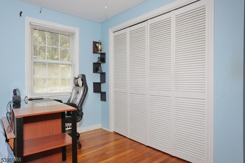 12 Pershing Avenue Ridgewood, NJ 07450 - Photo 27 of 42 a view of a workspace with furniture and a window