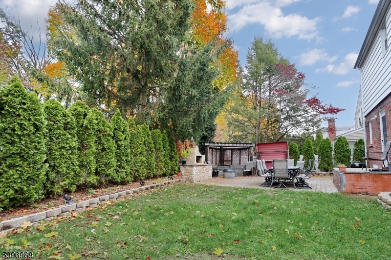 12 Pershing Avenue Ridgewood, NJ 07450 - Photo 35 of 42 a couple of table and chairs in the garden