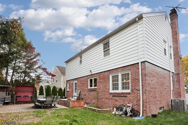 12 Pershing Avenue Ridgewood, NJ 07450 - Photo 36 of 42 a view of a house with a yard